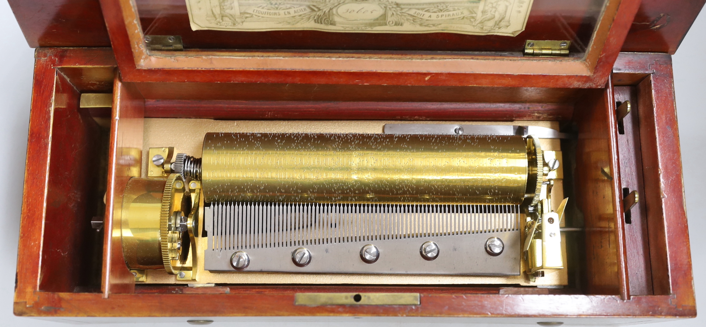 A 19th century Swiss 6-air music box, cylinder length 20.5cm.